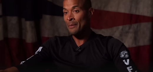 David Goggins with a flag-themed backdrop