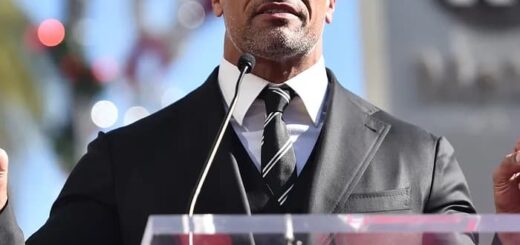 Dwayne Johnson speaking on the podium