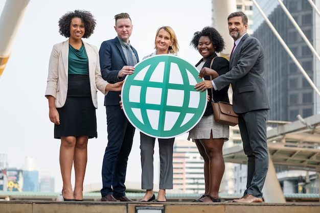business people holding a sign in the form world