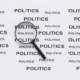 The magnifying glass lies in the word politics