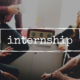 Group of people engaged in conversation with overlaid text 'internship'