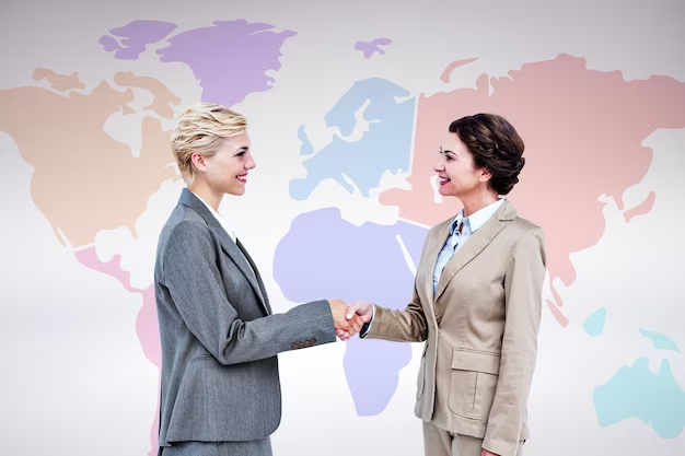 Smiling women shaking hands