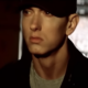 eminem in black hat looking forward
